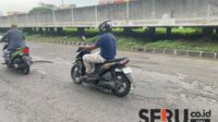 Jalan Taman Asri banyak berlubang. (sda1) - Tak Kunjung Diperbaiki, Jalan Raya Taman Asri Makin Penuh Lubang