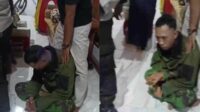 Terduga TNI gadungan saat diamankan di Mapolsek Gumukmas Jember. (ist) - TNI Gadungan di Jember Babak Belur Usai Tertangkap Massa Hendak Curi Motor