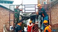 Babinsa Kedungkandang Edukasi Warga Mergosono Larang Buang Sampah di Sungai Brantas