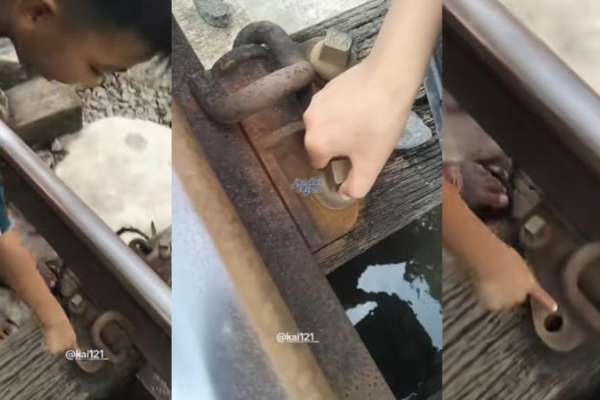 Tangkapan Layar video baut rel longgar di Jember. (Istimewa) - Bocah di Jember Laporkan Baut Rel Longgar yang Membahayakan Perjalanan Kereta Api