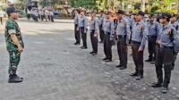 Babinsa Merjosari Tingkatkan Kapasitas dan Kedisiplinan Satlinmas dengan Latihan Baris-Berbaris