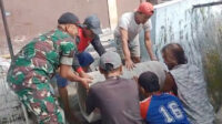 Babinsa Kedungkandang Bersama Warga Kerja Bakti Bersihkan Saluran Air