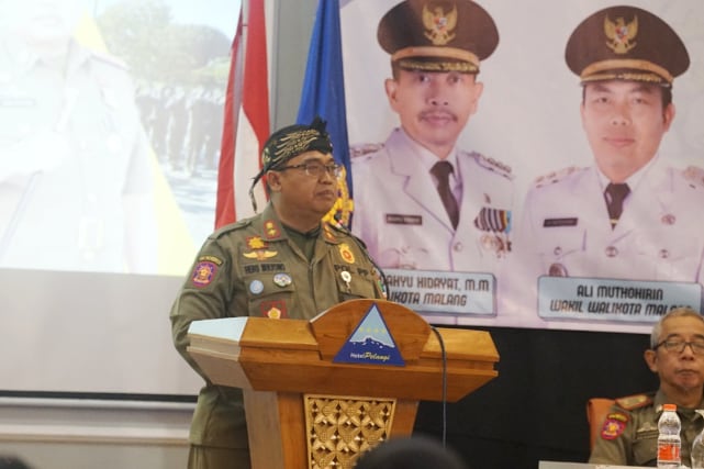 Kepala Satpol PP Kota Malang, Heru Mulyono menyampaikan, Sosialisasi Gempur Rokok Ilegal, 2025. (kom)