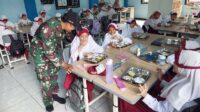 Babinsa Lowokwaru Dampingi Distribusi Makanan Bergizi Gratis ke Sekolah di Wilayah Tunggulwulung
