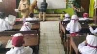 Babinsa Blimbing Dampingi Program MBG Dukung Peningkatan Gizi Anak SDN Arjosari 2