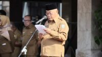 Bupati Malang tengah memberi sambutan dalam apel pagi dan penyerahan fasilitas pengelolaan sampah dan peluncuran Layanan Persampahan UPT-PP Tumpang Kloter III, Senin (6/10/2025). (ist) Pemkab Malang Serahkan Fasilitas Pengelolaan Sampah dan Peluncuran Layanan Persampahan UPT-PP Tumpang Kloter III