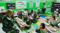 Babinsa Buring Dampingi Penyaluran Program MBG untuk Anak Sekolah