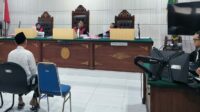 Terdakwa AMH saat menjalani Sidang perdana kasus dugaan Pencabulan Anak. (ist) PN Malang Gelar Sidang Perdana Kasus Pencabulan Anak, Terdakwa Dikenakan Pasal Berlapis