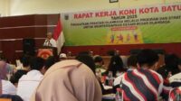 Kepala Dinas Pendidikan Kota Batu saat memberikan sambutannya di Raker KONI Kota Batu. (ist) Gelar Rakor, KONI Fokus Recovery Atlet Muda dan Percepatan Infrastruktur Pasca Porprov Jatim IX