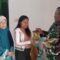 Babinsa Kedungkandang Dampingi Pembagian Bansos Beras Warga Sawojajar Kurang Mampu