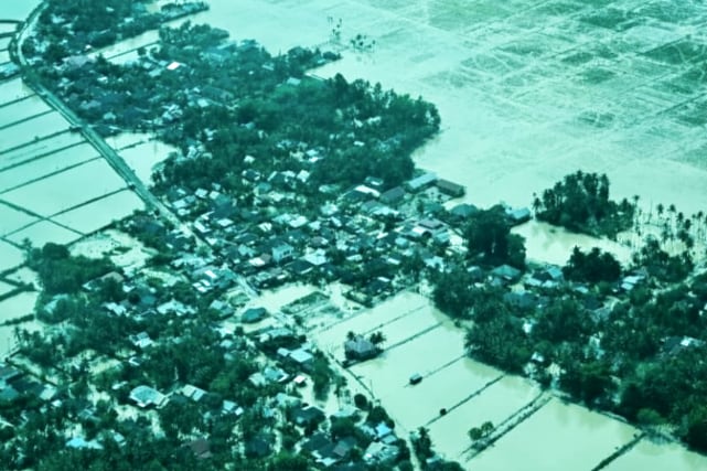Wilayah terdampak bencana di Aceh dari pantauan udara. (Dok BPMI Setpres) Korban Meninggal Banjir Sumatra Capai 914 Jiwa, Kemenhut Segel Lima Lokasi Pembalakan Liar