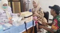Babinsa Kedungkandang dampingi imunisasi bayi dan balita di Posyandu Sawojajar. (ist) Babinsa Kedungkandang Dampingi Imunisasi Bayi dan Balita di Posyandu Sawojajar