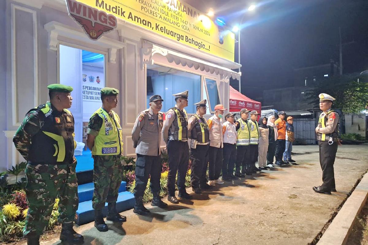 IMG_20260318_172355 Personel Koramil Kedungkandang pengamanan arus mudik jelang Idulfitri di Exit Tol Madyopuro. (ist)