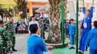 Koramil Kedungkandang bangun sarana pull up dan sit up di Ponpes Baitul Makmur. (ist) Koramil Kedungkandang Bangun Sarana Pull Up dan Sit Up di Ponpes Baitul Makmur