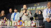 Jelang Pertandingan Arema FC Vs Persis Solo, Polres Malang Amankan Puluhan Botol Miras dan Sepeda Motor