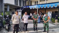 Babinsa Koramil dan Bhabinkamtibmas Kedungkandang Amankan Jalannya Ibadah di GKIN Narwastu