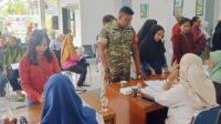 Babinsa Karangbesuki pantau pendistribusian Bantuan Pangan Tahap II Tahun 2026. (ist) Babinsa Karangbesuki Pantau Pendistribusian Bantuan Pangan Tahap II Tahun 2026
