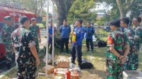 Personel Kodim 0833 latihan bersama Damkar penanggulangan kebakaran. (ist) Personel Kodim 0833 Latihan Bersama Damkar Penanggulangan Kebakaran