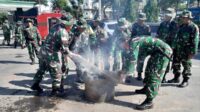 Personel Kodim 0833 Latihan Pemadaman Bahaya Kebakaran di Makodim