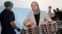 Petugas SPPG saat menyiapkan distribusi MBG. (Seru.co.id/bas) Baru 17.000 Bumil dan Balita Malang Dapat MBG, Percepatan Terhambat Pendataan hingga Dinamika Penolakan